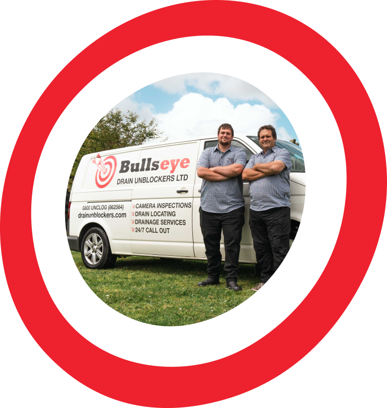 Bullseye team outside their van in a target