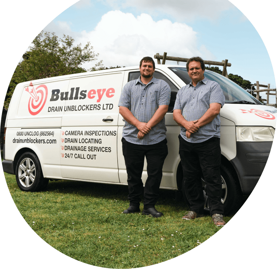 Bullseye team in front of work van